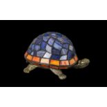 Tiffany Style Table Lamp in the Form of a Tortoise. Shade in blue and coral coloured glass.