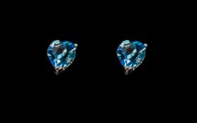 Sterling Silver Blue Topaz Heart Shaped Earrings.