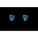 Sterling Silver Blue Topaz Heart Shaped Earrings.