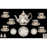 A Royal Albert Teaset 'Lavender Rose' comprising of a teapot, 6 cups, saucers and side plates,
