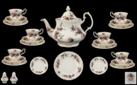 A Royal Albert Teaset 'Lavender Rose' comprising of a teapot, 6 cups, saucers and side plates,