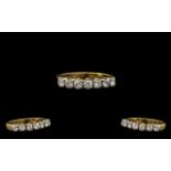 Ladies Attractive 18ct Gold Seven Stone Diamond Set Ring, the seven round brilliant cut diamonds,