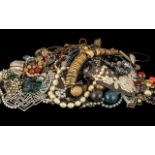 Large Bag of Costume Jewellery comprising statement necklaces, beads, shell bracelets,