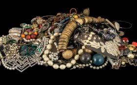 Large Bag of Costume Jewellery comprising statement necklaces, beads, shell bracelets,