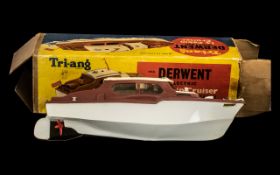 A Tri- Ang Derwent Electric 14 inch Cabin Cruiser moulded in tough plastic finished in correct