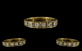 18ct Yellow Gold - Attractive 7 Stone Diamond Ring of Contemporary Design.