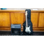 Modern Six String Electric Guitar marked encore. Together with carry case and a Vox Valvetronix.
