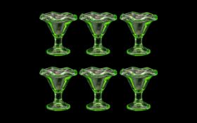 Art Deco Style Green Glass Sundae Dishes with fluted edges, pedestal style,