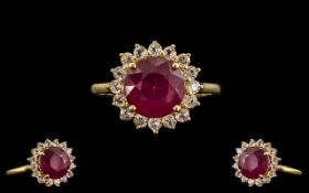 Ruby and White Topaz Halo Ring. A Round Cut Ruby of 5.