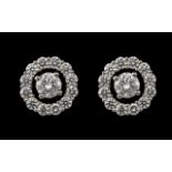 18ct White Gold Superb Quality & Attractive Pair of Diamond Set Earrings of contemporary design.