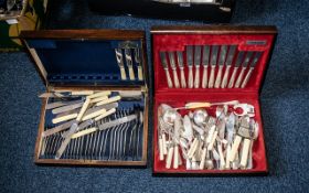 Two Boxed Sets of Vintage Cutlery, both housed in wooden storage boxes,