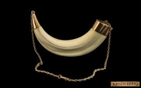 1930s Gold Mounted Boar's Tusk stamped 'Made in Kenya'; 9ct gold with attached chain; tusk size 4.