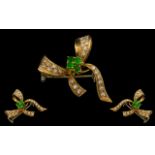 18ct Gold - Attractive Emerald and Diamond Set Bow Brooch. Marked 18ct - 750.