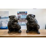 A Pair of Reproduction Bronze Figures of Standing Bull Dogs with expressive faces. Measuring 21