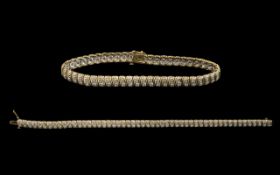 9ct Gold Diamond Bracelet each link set with a round cut diamond. Fully hallmarked. Length 7.