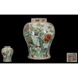 Chinese Famille Verte Decorated Baluster Shape Vase depicting birds amongst foliage; red character
