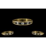 9ct Gold Ladies CZ Dress Ring. Ring size J. Attractive channel-set ring in 9ct setting.