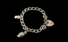 Solid Silver Charm Bracelet with Charms, comprising a hinged Noah's Ark and a hinged acorn.