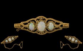 Ladies 9ct Gold 3 Stone Opal Set Ornate Brooch, with attached safety chain,