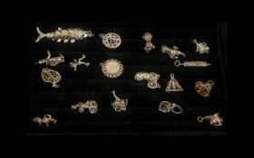 A Collection of Sterling Silver Charms, all marked 925, comprising a clown, a lantern,