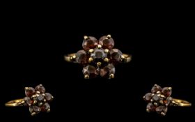 Ladies 9ct Gold Garnet Set Cluster Ring, Flower head Setting. Fully Hallmarked for 9ct - 375.