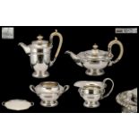 A Fine Quality Silver Four Piece Teaset of Large Robust Size with matching oval tray free from any