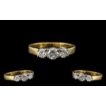 18ct Yellow Gold - Attractive 3 Stone Diamond Set Dress Ring. Full Hallmark for 18ct - 750.