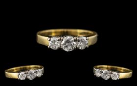 18ct Yellow Gold - Attractive 3 Stone Diamond Set Dress Ring. Full Hallmark for 18ct - 750.