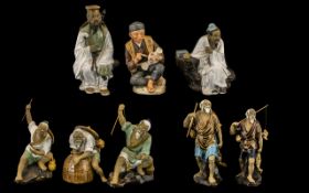 A Collection Of Chinese Mud Men Figurines - Each Brightly Glazed And Made By Hand.