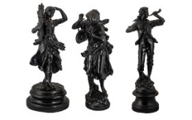 Three Antique French Patinated Spelter Figures depicting a man with a horn,