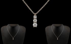 18ct White Gold Superb Quality & Attractive Designed 3 Stone Diamond Set Drop Pendant.