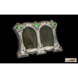Art Nouveau Style Small Silver Twin Photo Frame of sinuous tulip design, marked sterling. 3" x 4.