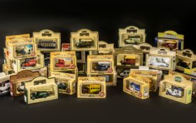 A Collection of Diecast Models to include mostly Lledo advertising trucks.