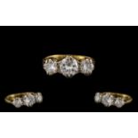 18ct Gold Attractive and Quality Three Stone Diamond Set Ring marked 18ct to interior of shank.