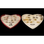 2 Moschino Heart Shaped Display Cases & A Collection of 30 Scarf Clips.