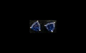 Ceylon Blue Coloured Quartz Stud Earrings, trillion cut solitaires of 3.