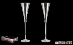 A Fine Pair of Stylish and Contemporary Designed Sterling Silver Champagne Flutes by Robert Carr