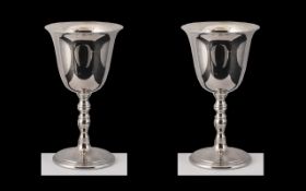 Elizabeth II Fine Quality Pair of Sterling Silver Goblets with plain bowls on turned supports,