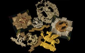 A Collection of Military Cap Badges Regiments to include 16 Queens Lancers, The Royal Scotts,