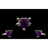 Amethyst Heart Shape and Feature Setting Ring, a 9ct heart cut, deep purple amethyst held in an