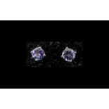 Tanzanite Solitaire Stud Earrings, a pair of round cut tanzanites, classically set,