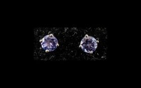 Tanzanite Solitaire Stud Earrings, a pair of round cut tanzanites, classically set,