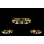 9ct Gold Ladies CZ Dress Ring. Ring size J. Attractive channel-set ring in 9ct setting. Please see