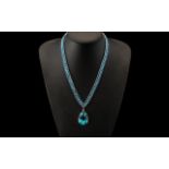 Blue Topaz Colour Crystal Pendant Necklace, a pear shaped, deep topaz blue colour, pendant with a