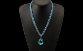 Blue Topaz Colour Crystal Pendant Necklace, a pear shaped, deep topaz blue colour, pendant with a