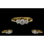 18ct Gold and Platinum - Attractive 3 Stone Diamond Set Dress Ring. Full Hallmark for 18ct - 750