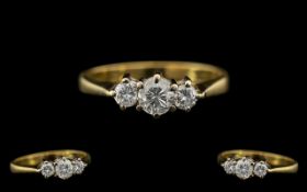 18ct Gold and Platinum - Attractive 3 Stone Diamond Set Dress Ring. Full Hallmark for 18ct - 750