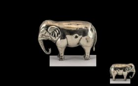 A Small Silver Novelty in the Form of An Elephant hallmark for Birmingham g 1906. Length 68 mm.