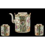 Antique Chinese Canton Mandarin Pattern Teapot, decorated in coloured enamels of typical hues.