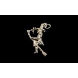 Silver Charm depicting a Witch on a broomstick with a small moon and star. Please see photograph.